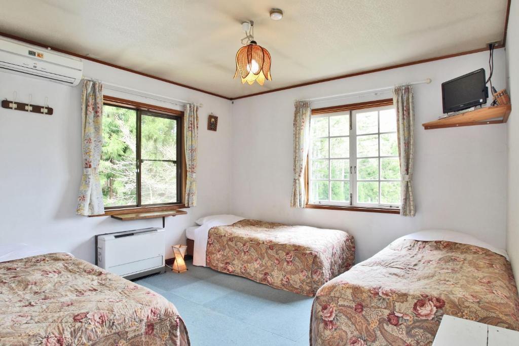 Bed and Breakfast ペンション ちゃうちゃう Hakuba Zimmer foto